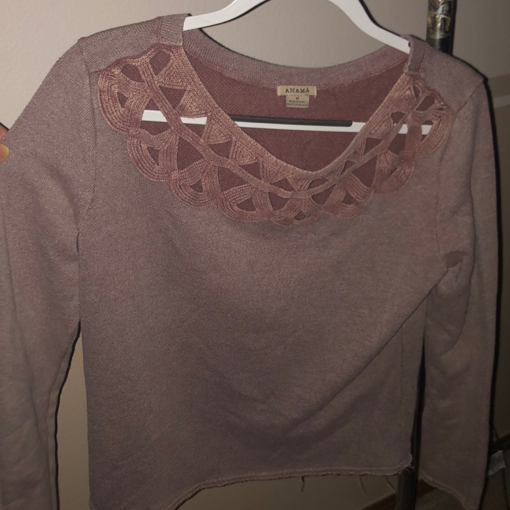 Cute sweater with fun scooped neck pattern